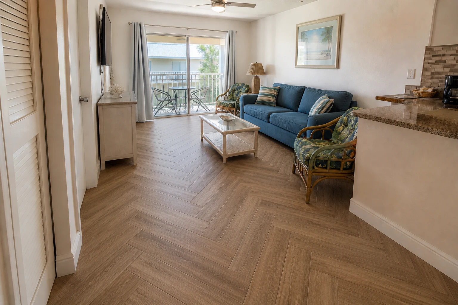Cocoa Beach condo after Alamo Oak style waterproof LVP Vinyl Plank Flooring in a herringbone pattern