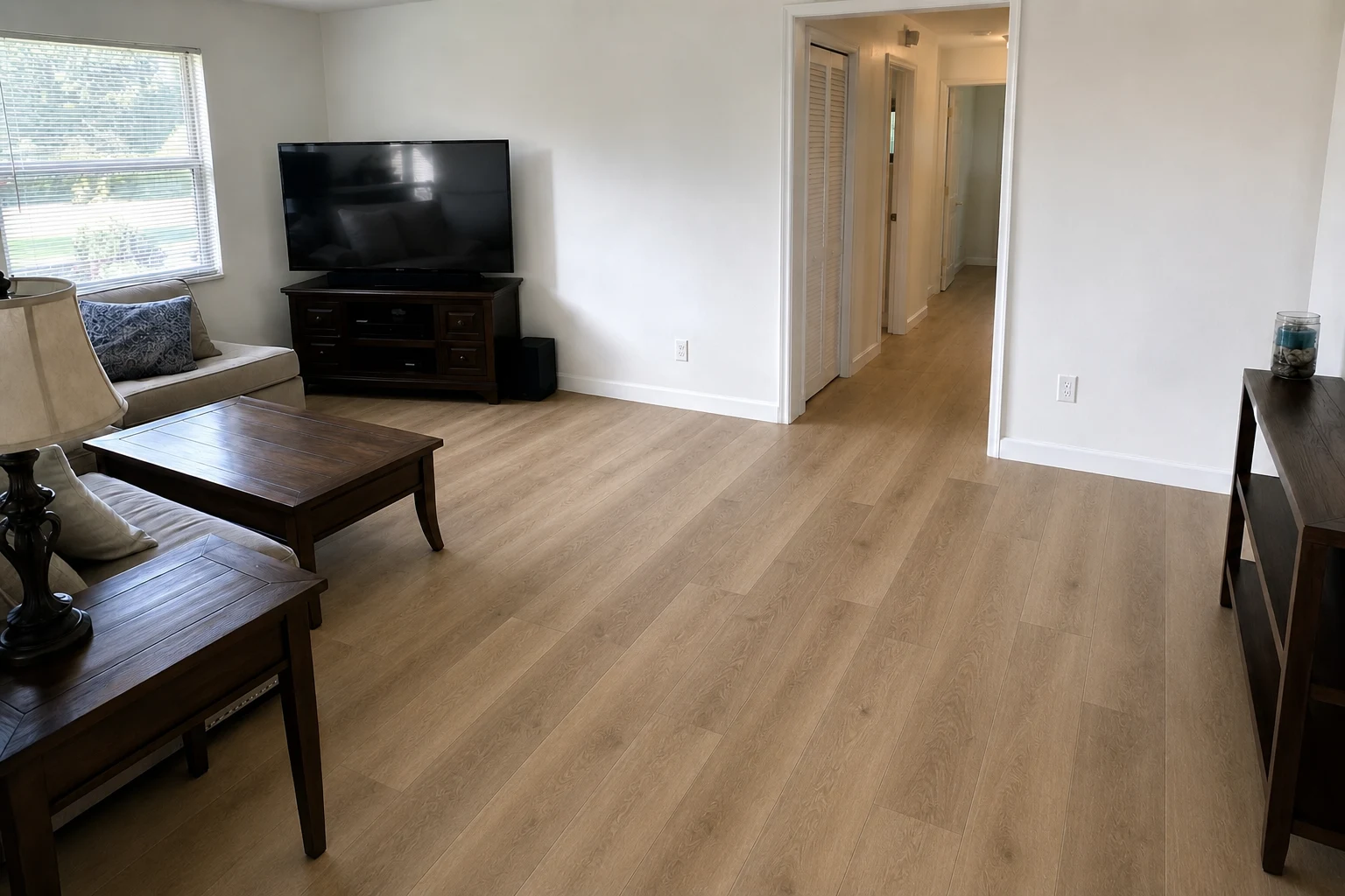 Rockledge family room after Cedar Point style LVP Vinyl Plank Flooring in a random stagger pattern